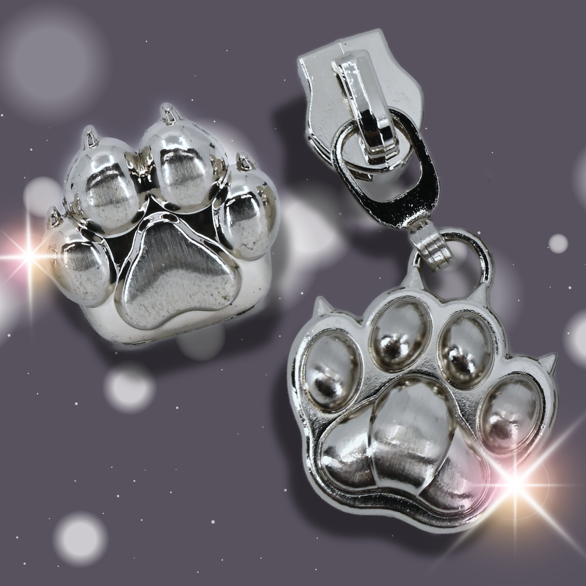 Silver paw-shaped zipper pulls and purse feet